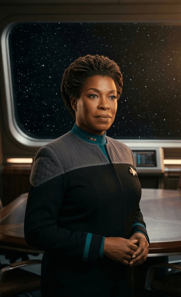 Lorraine Toussaint as Dr. Marie Bourget. Doctor Marie Bourget, Chief Medical Officer of the USS Cantabrian, stands in the observation lounge aboard the USS Cantabrian-A in 2376.